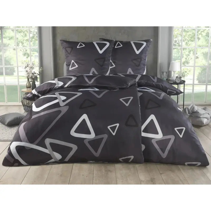 Schwarzes bettwäsche-set 135x200 4-teilig mit modernem geometrischem muster aus weißen und grauen dreiecken