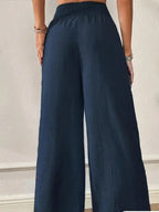 Dunkelblaue elegante weite hose damen mit hohem bund und elastischem saum für casual palazzo look alle saisonen