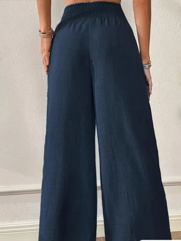 Dunkelblaue elegante weite hose damen mit hohem bund und elastischem saum für casual palazzo look alle saisonen
