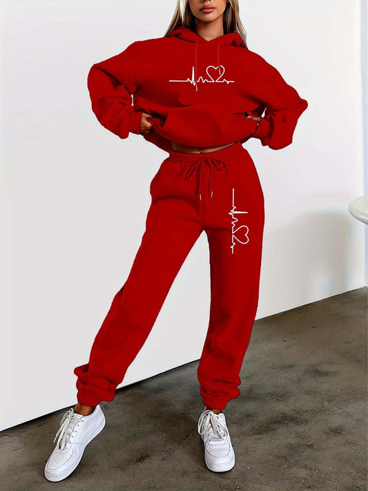 Produktbild von Damen Zweiteiler Cozy – Fleecegefütterter Hoodie & Jogginghose in Grau mit Herzschlag-Print, ideal für Herbst & Winter – hochwertig verarbeitet für tägliche Anwendung