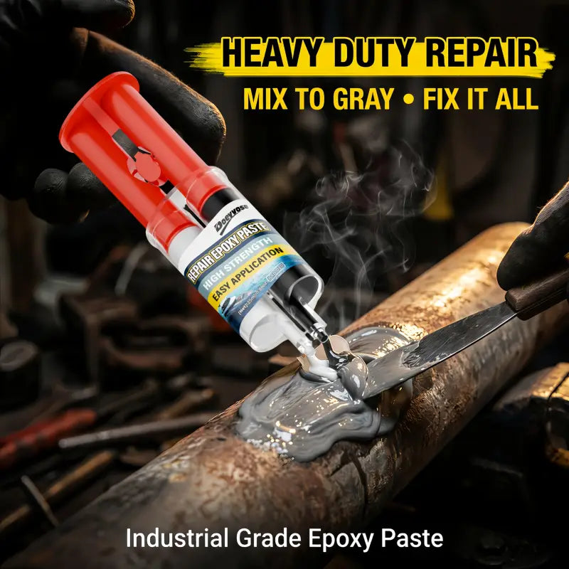Metall-epoxid reparaturpaste 25ml in rot und weiß wird auf metallrohr aufgetragen zum leck dichten und reparieren