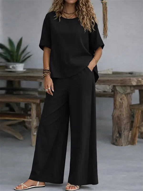 Schwarzes damen casual 2-teiliges set mit kurzarm shirt und weiter hose für entspannte alltagslooks