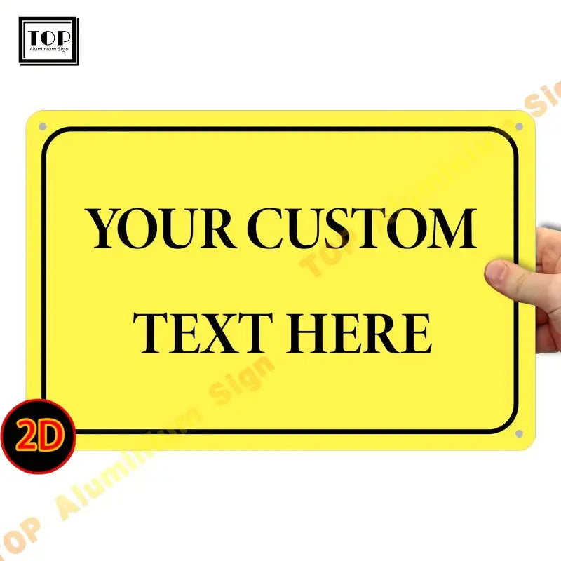 Personalisiertes 2d-wandschild aus aluminium in gelb mit schwarzem rand und individuell bedrucktem text