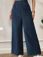 Dunkelblaue elegante weite hose mit strukturierter stoffe und smockbund casual palazzo hose für alle saisons