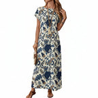 Offwhite damen blumenkleid kurzarm mit navyblauen und goldenen floralen mustern in lockerem maxi-schnitt