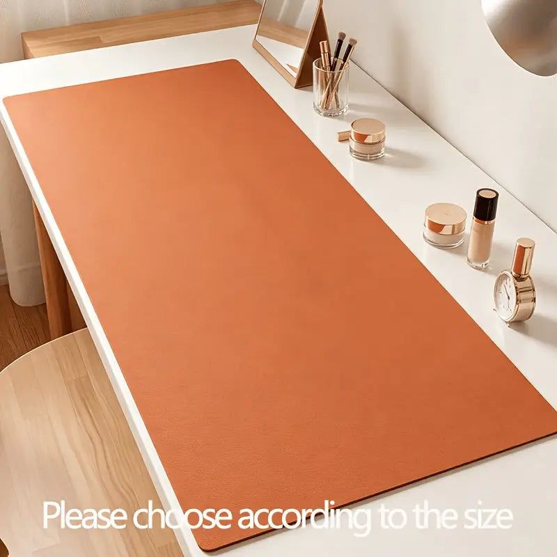 Eine matte orange kunstleder schminktisch unterlage mit glatter leicht strukturierter oberfläche vanity pad wasserabweisend