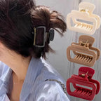 Eine elegante schwarze flexible silikon-haarklammer mit metallakzenten ideal für besondere anlässe online bestellen
