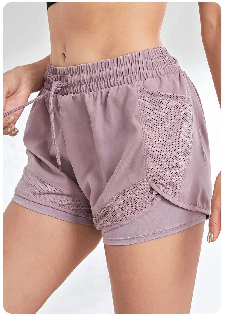 Elastische Sportshorts für Damen, Shorts mit Taschen, gefälschte zweiteilige Yoga-Leggings zum Laufen und Training