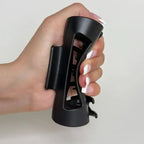 Schwarze flexible silikon-haarklammer mit rutschfesten griffen in modernem design zum online bestellen