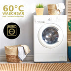 Weiße frontlader waschmaschine mit klarem glastür und bedienfeld, ideal für bettwäsche-set 135x200 4-teilig