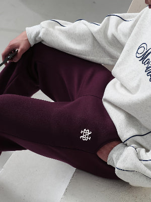 Detailansicht bestickte Winterhose aus Polyester mit leicht elastischem Stoff und geradem Bein