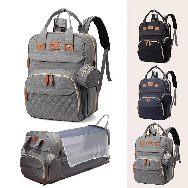 Grauer gestepptes grovy eltern-rucksack mit braunen lederdetails und vielen fächern als multifunktionale wickeltasche online bestellen